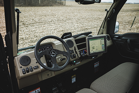 2024 John Deere Gator™ XUV865M HVAC Cab. Photograph shows the 2023 model.
